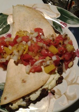 A picture of Baked meatless tacos (with fresh salsa).