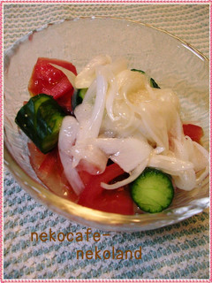 A picture of Tomato and Jabara Cucumber with Onion Dressing.