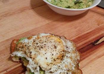 Fast Cooking Methods toasted ciabatta slice with mashed avocado spread and fried egg Delicious and Healthy