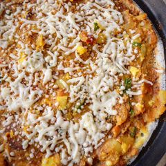 A picture of Open Cheese Masala Dosa.