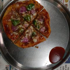 A picture of Roti cheese Pizza (Home made).