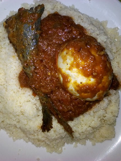 A picture of Plain white Couscous and stew.
