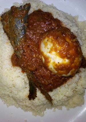 A picture of Plain white Couscous and stew.