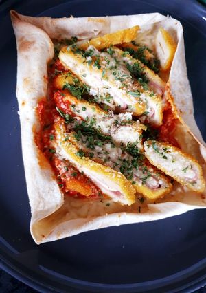 Une photo de Pizza 🍕 wrap minutes cordon bleu 😋