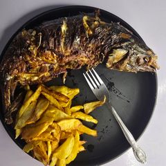 A picture of Oven-Grilled Fish: Crispy Outside, Tender Inside.