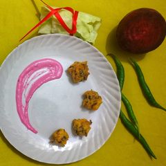 A picture of Crispy Cabbage Pakoda with Beetroot Dip.