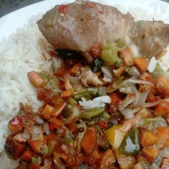 White rice and chicken sauce for xmas groove 🎄🎄 A picture of White rice and chicken sauce for xmas groove 🎄🎄.