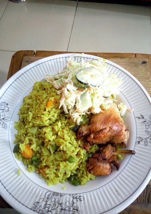 A picture of Fried rice with chicken.