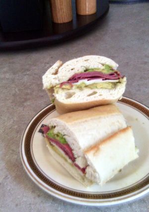 A picture of Katie's Smoked meat sandwich.