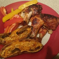 A picture of Sweet Chilli Chicken Thighs & Baked Sweet Potato Halfs.