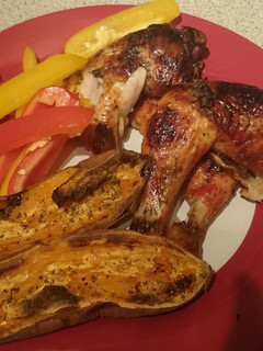 A picture of Sweet Chilli Chicken Thighs & Baked Sweet Potato Halfs.
