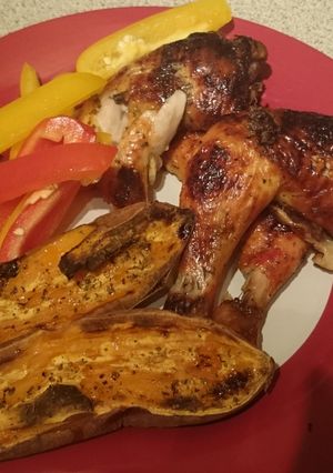 A picture of Sweet Chilli Chicken Thighs & Baked Sweet Potato Halfs.