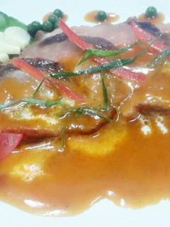 A picture of Kanya's Seared Duck Breast with Red Curry Sauce.