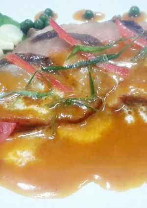 A picture of Kanya's Seared Duck Breast with Red Curry Sauce.