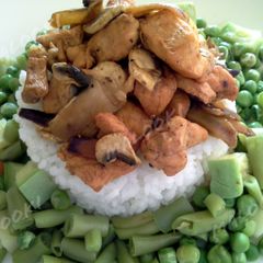 A picture of Grilled chicken with steamed vegetables and rice.