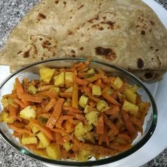 Gajar aalo ki sabzi parathay ke sath A picture of Gajar aalo ki sabzi parathay ke sath.