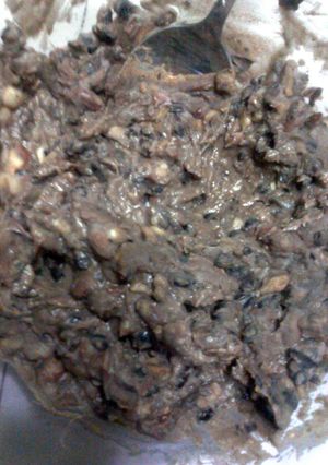 A picture of refried black beans.