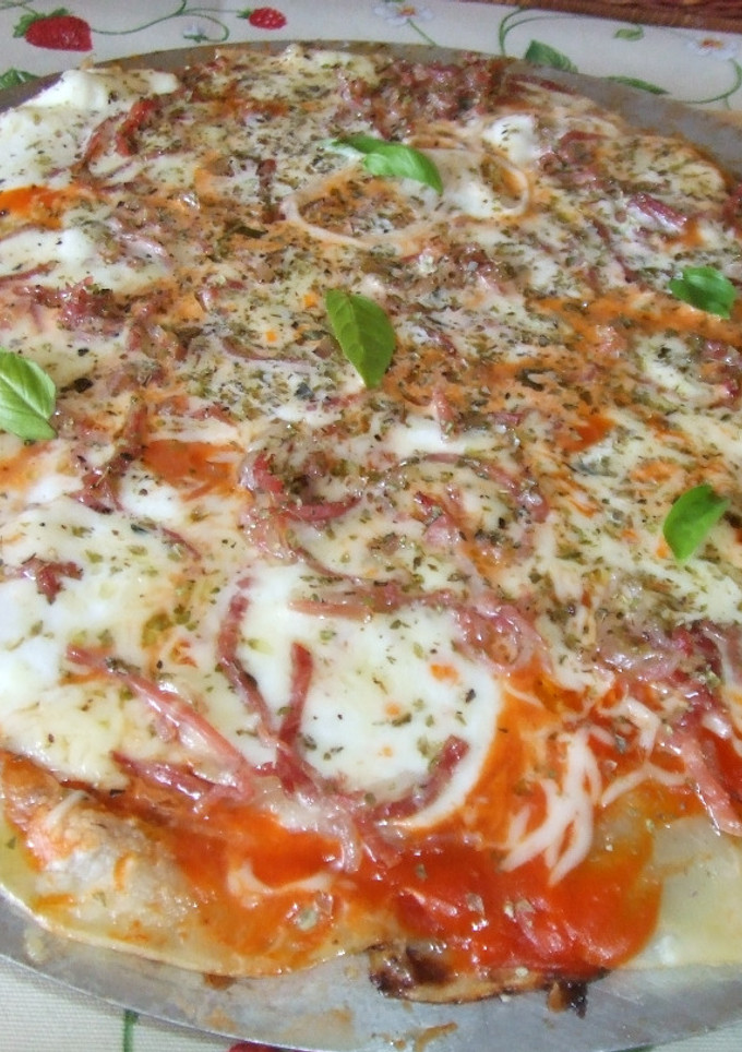 Una foto de Pizza de patatas en pétalos