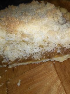Una foto de Torta de coco y dulce de leche