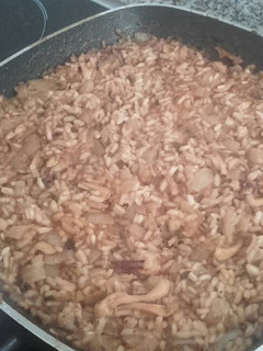 Una foto de Arroz con chipirones
