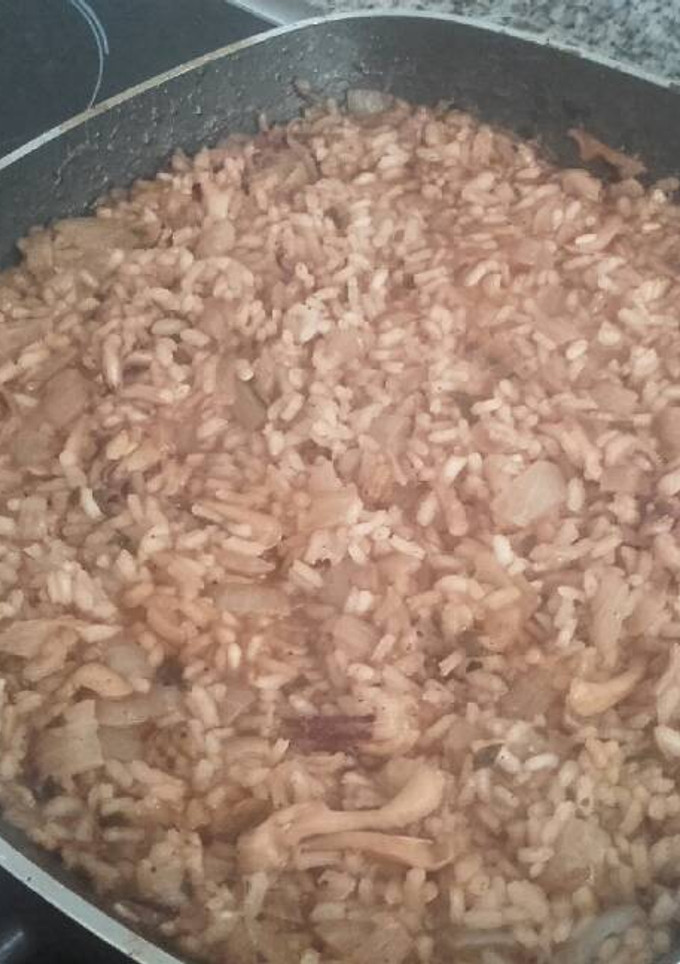 Una foto de Arroz con chipirones