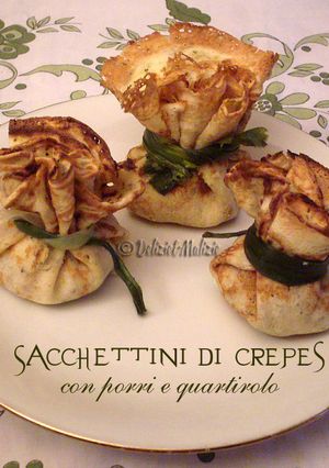 Foto di Sacchettini di crepes con porri e quartirolo