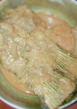 A picture of Rui posto (rohu fish cooked in poppy seeds paste).