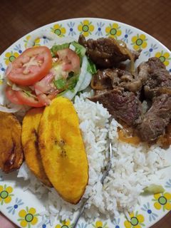 Una foto de Bistec encebollado