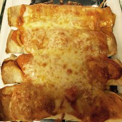 A picture of Creamy Rotisserie Chicken Enchilada.