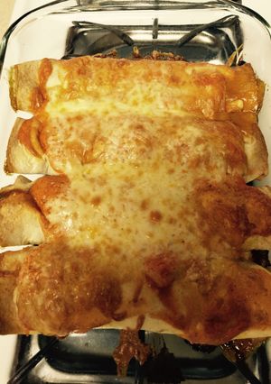 A picture of Creamy Rotisserie Chicken Enchilada.