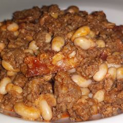 A picture of Mongetes amb Cansalada i Botifarra Esparrecada (Kidney Beans with Bacon and Botifarra Sausage ).