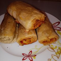 A picture of Baked homemade fish roll.