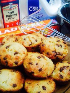 A picture of Orange & Macadamia Muffins.