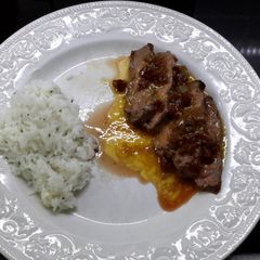 A picture of Chipotle Flank Steak with rice.