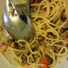 A picture of Pasta with Sausage, Tomatoes and Cream.
