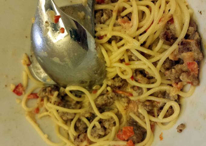 Steps to Make Homemade Pasta with Sausage, Tomatoes and Cream