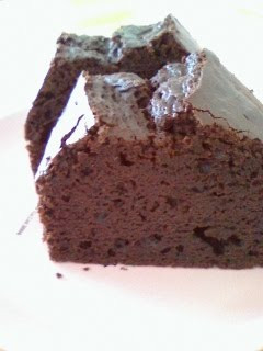 A picture of Chocolate Brownies with Heavy Cream and Cocoa Powder.