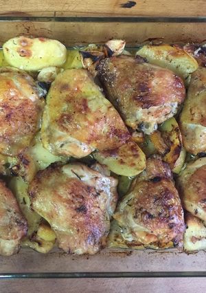 Una foto de Muslos de pollo al horno