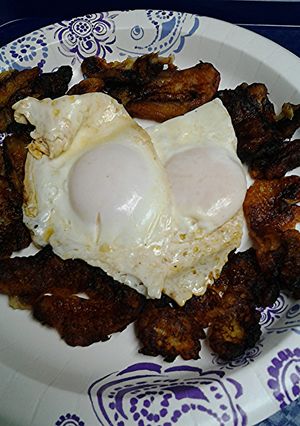 A picture of Banana and eggs breakfast.