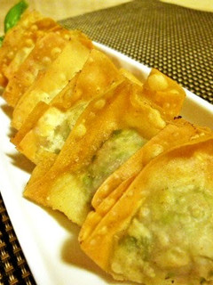 A picture of Fried Wonton Dumplings with Chrysanthemum Leaves Seasoned with Yuzu Pepper Paste.