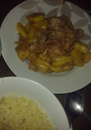 A picture of Pineapple Beef with fried rice.