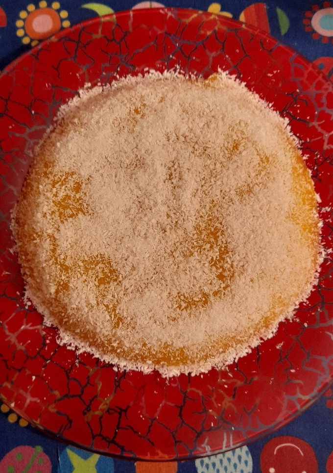 Una foto de Pastel de naranja con coco