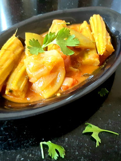 A picture of Drumstick, rawmango pulusu.