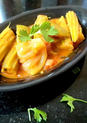 A picture of Drumstick, rawmango pulusu.