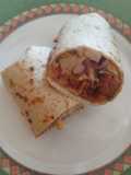 Burrito con pulled pork e coleslaw