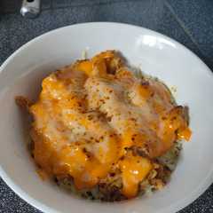 A picture of Tuna/chicken Mentai Rice with Mozarella.
