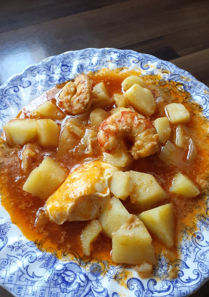 Una foto de Guiso de langostinos con patata