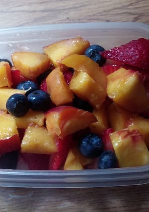 A picture of Sweet berries oh my peaches 😮.