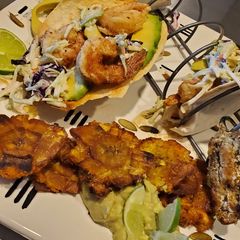 A picture of My Salt and Pepper Shrimp Taco with Tostones and Garlic Aioli.