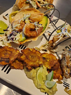 A picture of My Salt and Pepper Shrimp Taco with Tostones and Garlic Aioli.